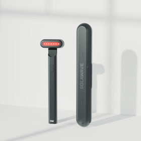 An image of a Solawave red light therapy device with a travel case || Black