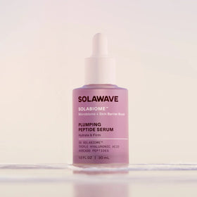 Bottle of Solawave Pre- & Probiotic Plumping Peptide Serum on a plain background.