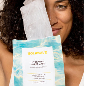 An image of a woman holding hydrating facial masks || 1 Pack