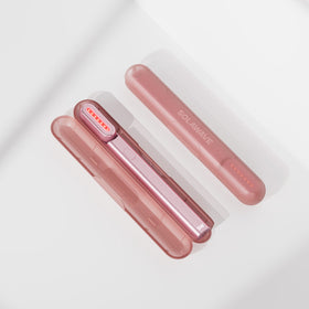 An image of a Solawave red light therapy wand inside a travel case || Rose Gold