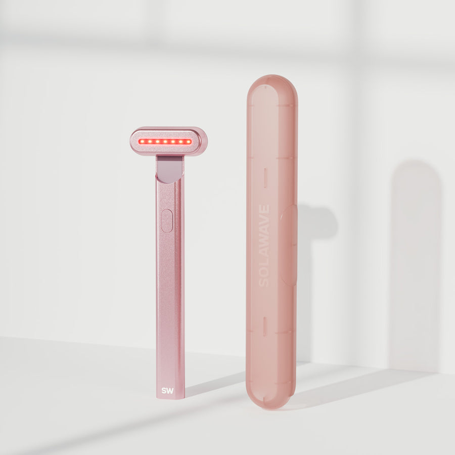 An image of a Solawave red light therapy wand with a travel case || Rose Gold