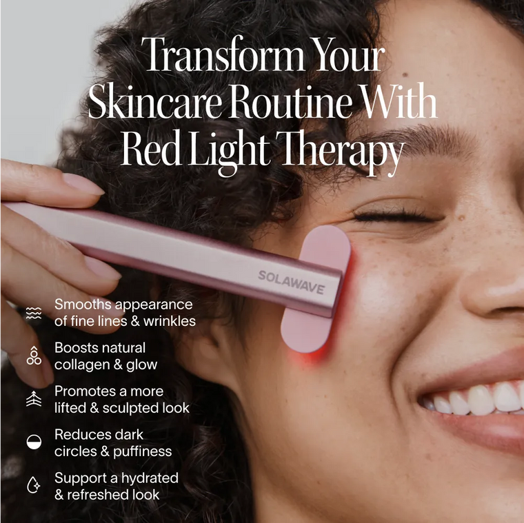 A smiling woman uses the pink Solawave 4-in-1 Red Light Therapy Wand & Activating Serum Kit on her cheek, with text highlighting benefits such as reducing fine lines and wrinkles, boosting collagen, fading dark spots, and hydrating skin.