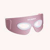 Solawave Radiant Renewal Eye Recovery Pro red light therapy eye mask in pink, with soft silicone eye cutouts.