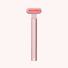 Rose gold handheld device with red light on a white background || Rose Gold